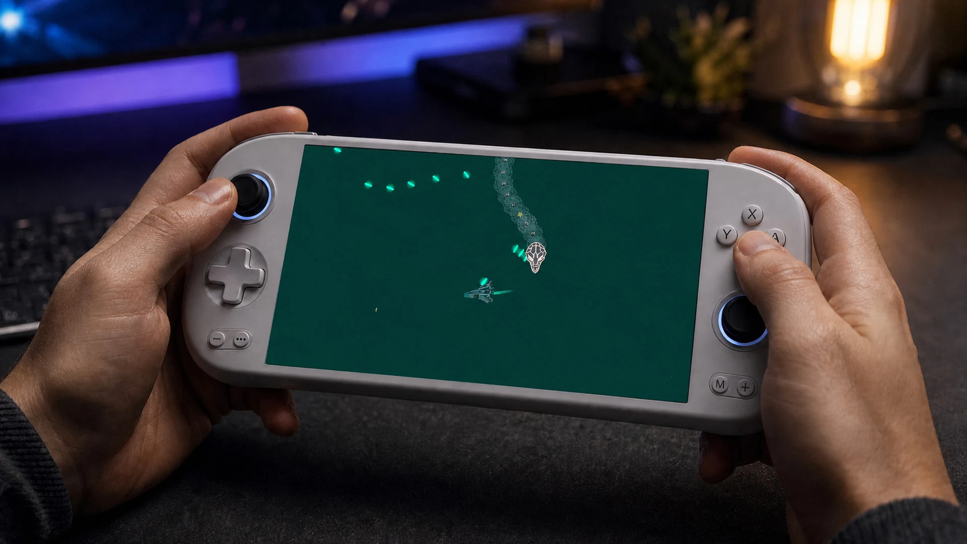 Starfang live combat gameplay shown on a Kermzilla handheld gaming concept